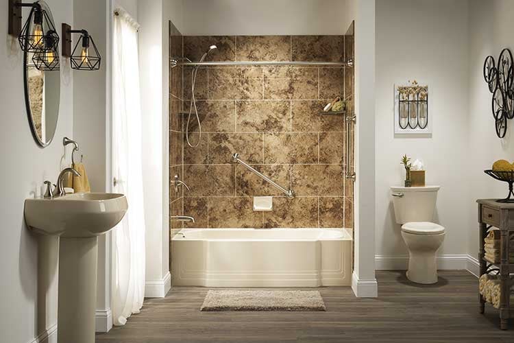 A finished tub-to-shower bathroom remodel with a low-maintenance stone-look wall surround